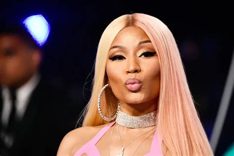 niki minaj naked|Nicki Minaj strips down in completely nude NSFW 39th birthday。